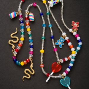 Guia de Erê de Oxumarê Artesanal | Serpentes Douradas, Doces e Cores do Arco-Íris